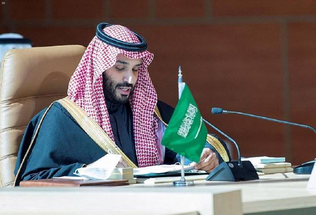 Saudi Arabia's Crown Prince Mohammed bin Salman signing the agreements.