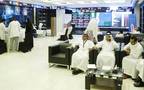 مستثمرين بقاعة التداول في سوق المال السعودية