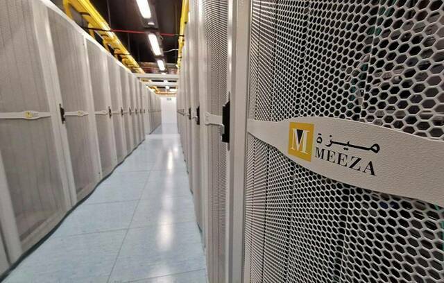 شركة "ميزة كيو إس تي بي"